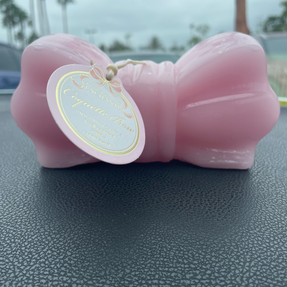 Pink coquette bow candle
